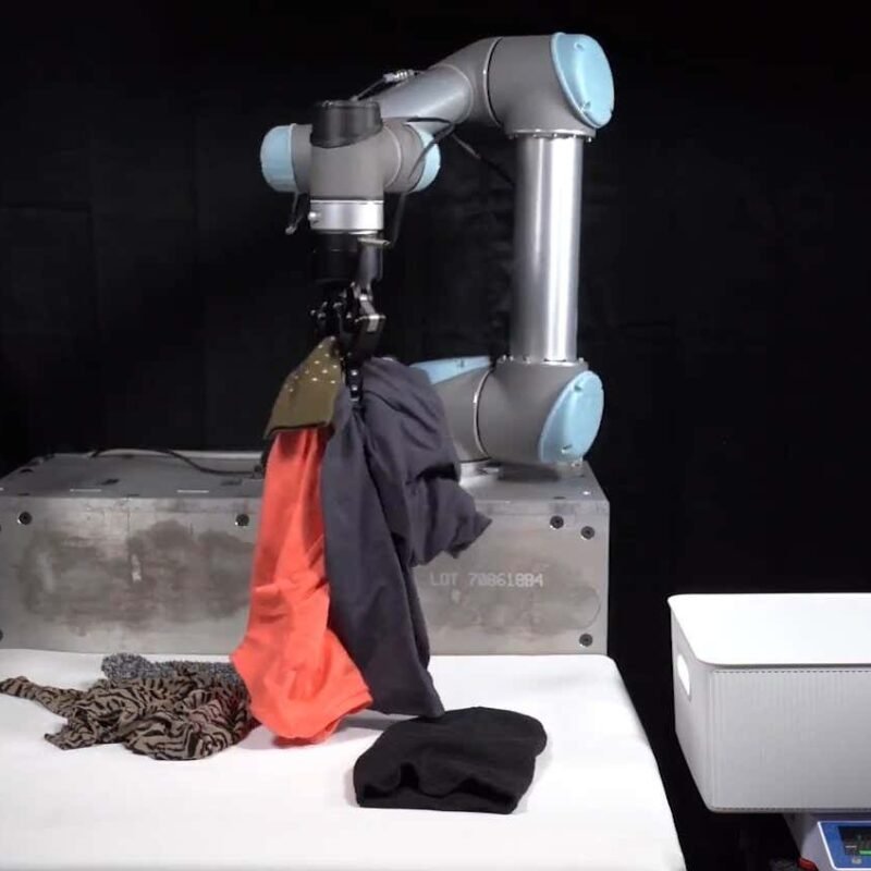 AI cleansing robotic can tidy up garments in a messy bed room