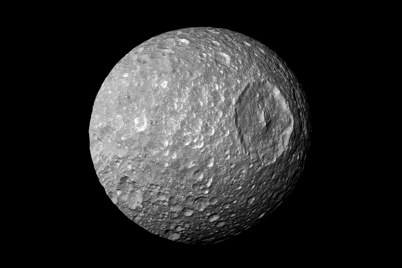 Saturn’s moon Mimas may be hiding a vast global ocean under its ice