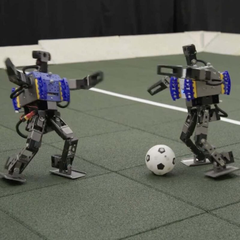 Watch mini humanoid robots showing off their football skills