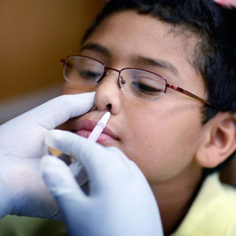 Flu vaccine for children linked to pneumonia risk for their relatives