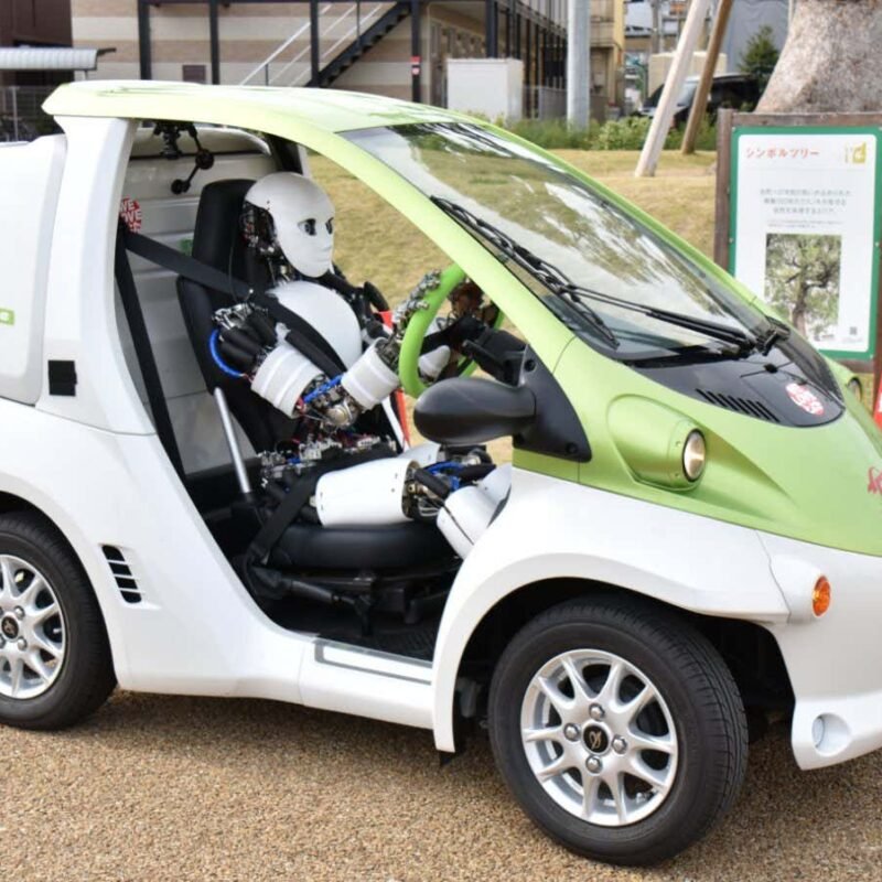 Watch a humanoid robot driving a car extremely slowly