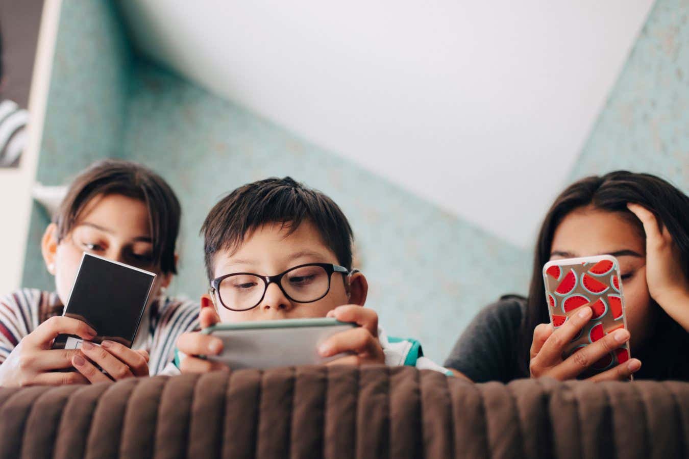 Phased introductions to smartphones will help kids more than bans