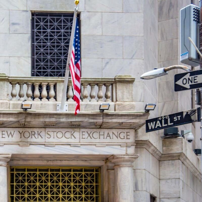 Cosmic rays can help synchronise the global financial system