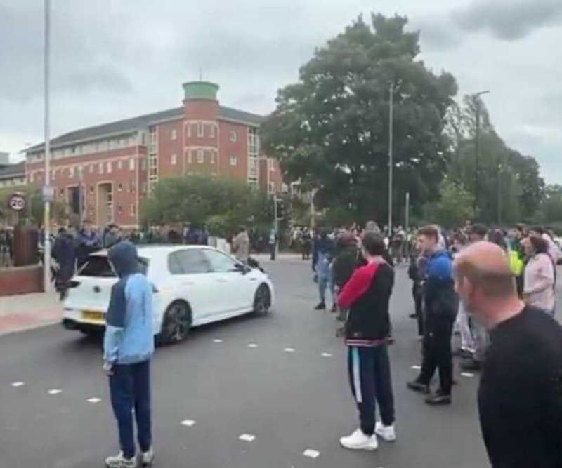 Rioters set up ‘race check point’ screening cars and only letting white drivers pass