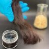 Hair conditioner made from wood is black and smelly, but eco-friendly