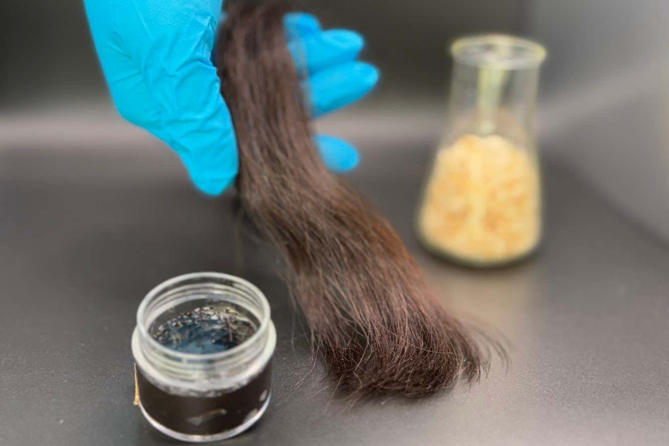 Hair conditioner made from wood is black and smelly, but eco-friendly