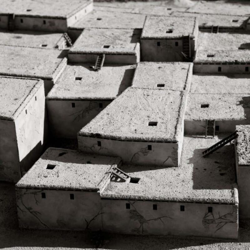 When did people start building houses with corners?